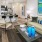 Living area with comfortable furniture and wood flooring.